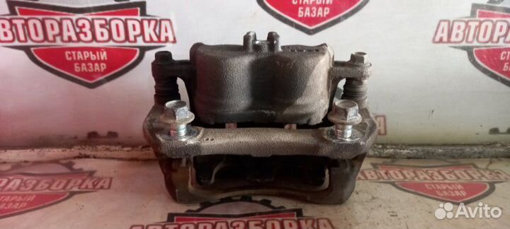 Суппорт тормозной передний правый Honda Cr-V RM4