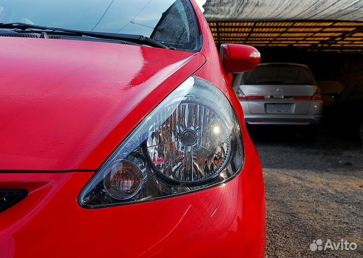 Стекло левой фары Honda Jazz 1 рест GD 2005-2008