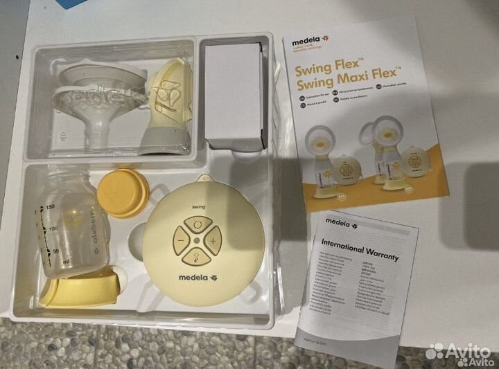 Молокоотсос medela swing flex
