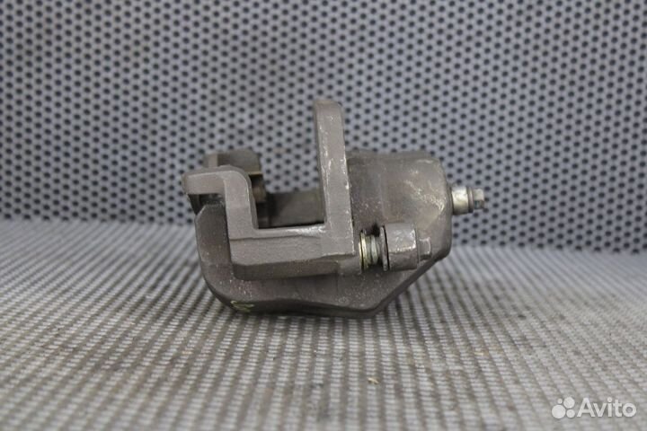 Суппорт тормозной передний левый Kia Sorento BL D4