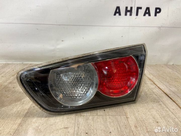 Фонарь в крышку багажника задний Mitsubishi Lancer