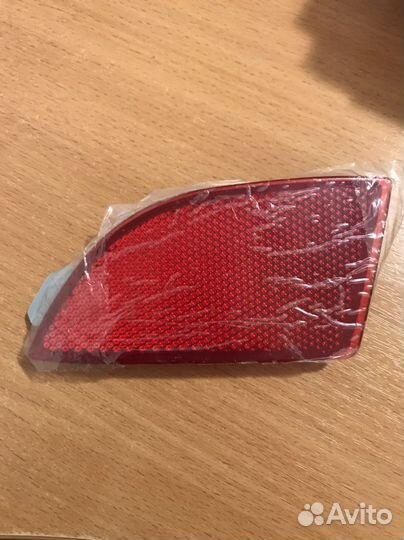 Катафот заднего бампера левый Mazda 3 BL хэтчбек