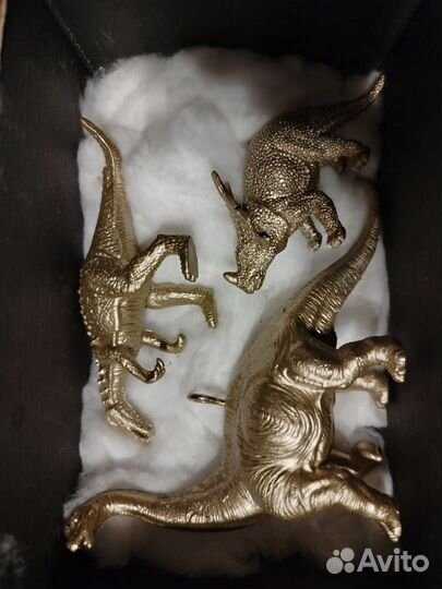Елочные игрушки золотые динозавры