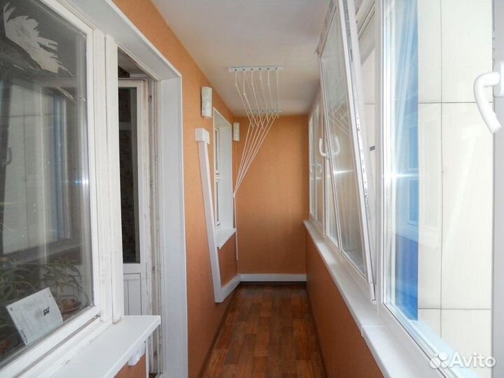 Остекление балкона с отделкой