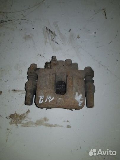 Суппорт тормозной задн. лев