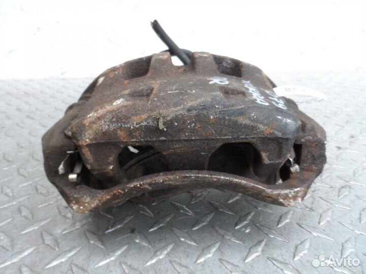 Суппорт передний правый Nissan Xterra N50