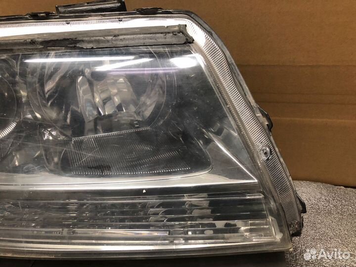 Стекло фары правой Suzuki Grand Vitara 05-15