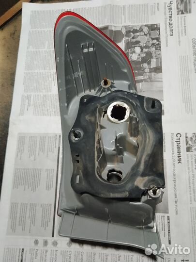 Наружный левый фонарь оригинал Тойота Королла