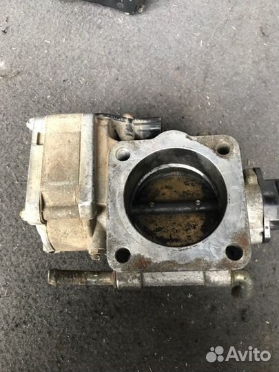 Дросельная заслонка Mitsubishi Lancer