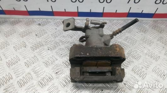 Суппорт тормозной задний левый toyota corolla E15