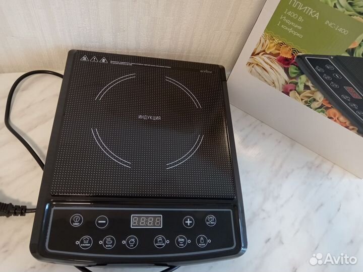 Индукционная плита