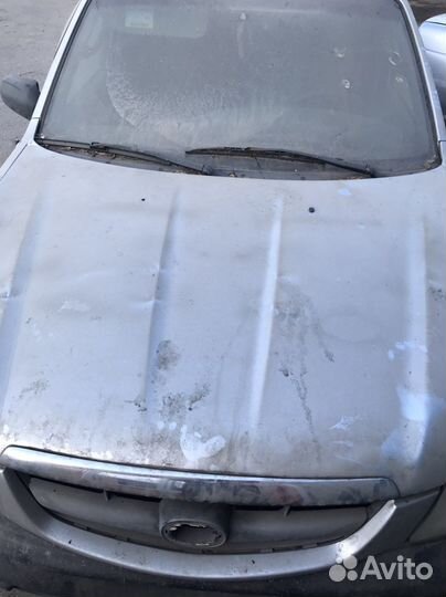 Капот Mazda Tribute 1