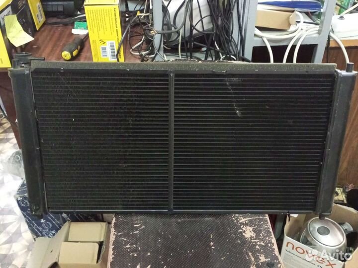 Радиатор новый Mazda 323f механика