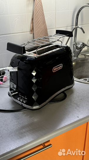 Тостер delonghi