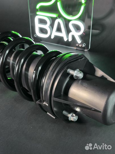 Передний амортизатор с пружиной Cadillac Escalade