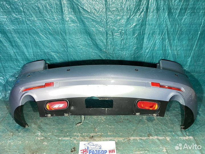 Бампер задний Mazda CX-7 I (2006—2009)