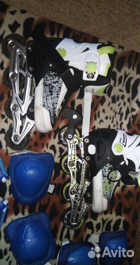 Роликовые коньки