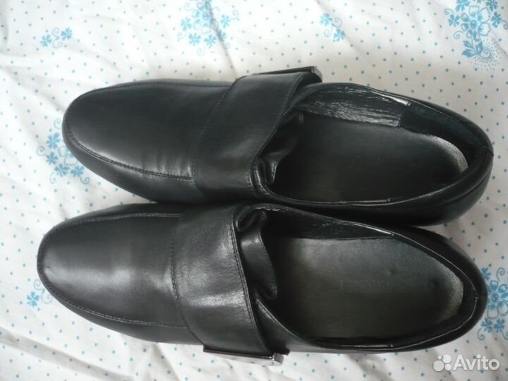Новые кожаные туфли
