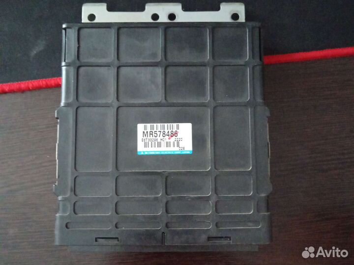 Блок управления двигателем lancer cedia