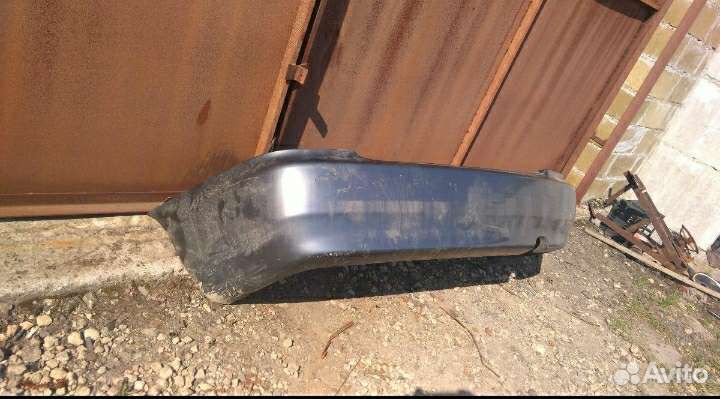 Бампер задний Мазда 323 BA