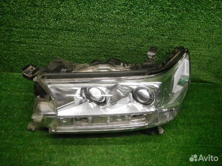 Фара левая Toyota Land Cruiser