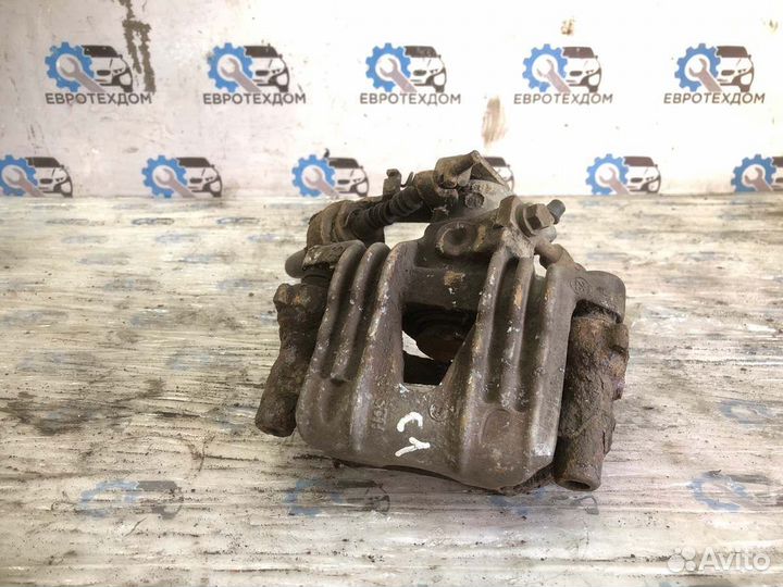 Суппорт передний правый Opel Astra G универсал