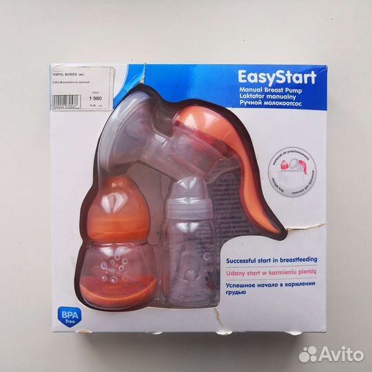 Новый молокоотсос ручной + бутылочка Canpol