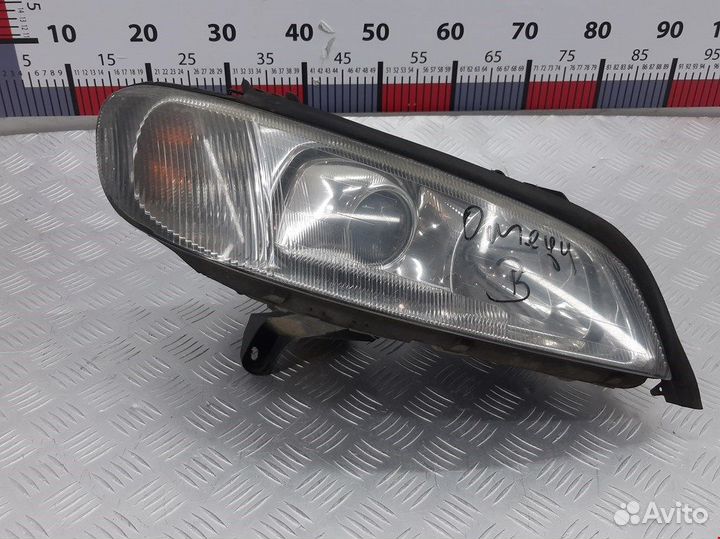 Фара передняя для Opel Omega B 9193418