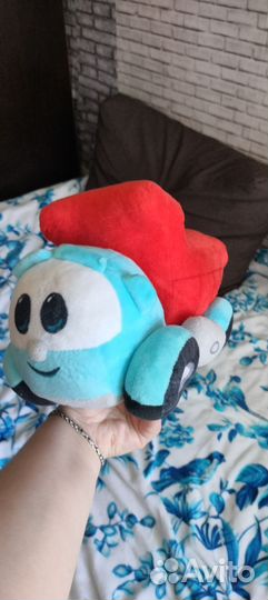 Грузовичок лева игрушка
