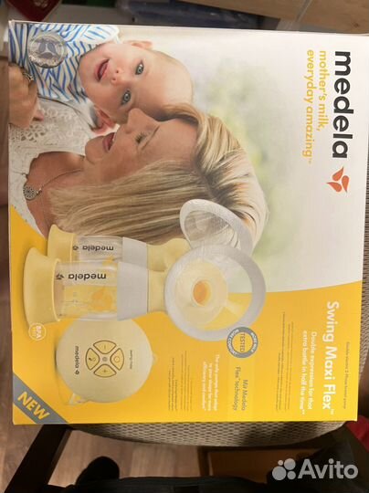 Молокоотсос medela swing maxi flex