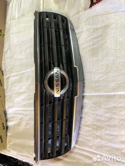 Решетка радиатора nissan almera classic с эмблемой