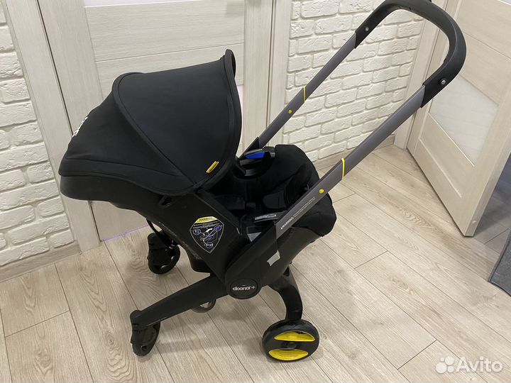 Коляска-автокресло Doona plus + isofix +аксессуары