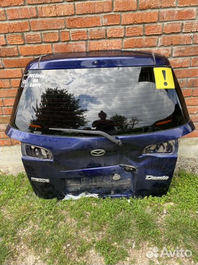 Крышка багажника mazda demio