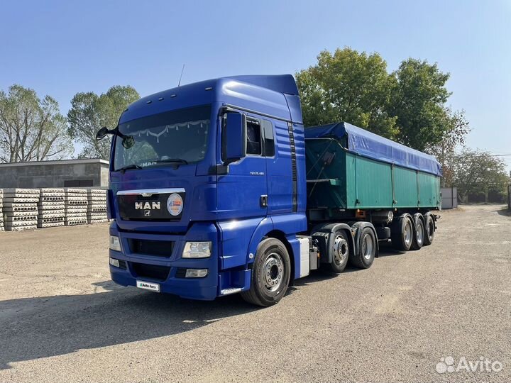MAN TGX 26.480 с полуприцепом, 2012