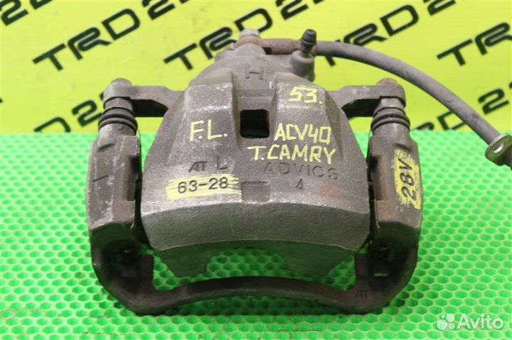 Суппорт тормозной передний левый Toyota Camry