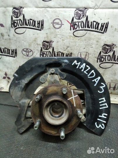 Кулак (цапфа) передний правый Mazda 3 седан Z6