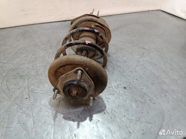 Стойка подвески передняя правая Mitsubishi Lancer