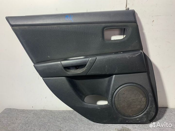 Обшивка двери задняя левая Mazda 3 BK