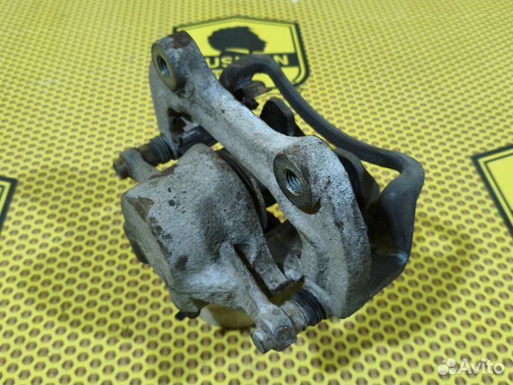 Суппорт тормозной передний левый Opel Insignia