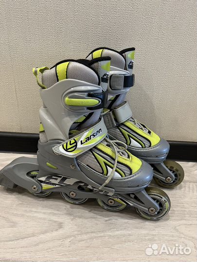 Роликовые коньки