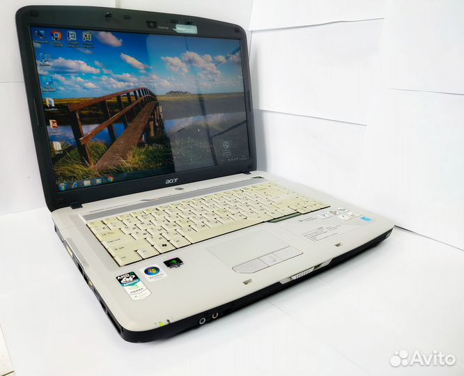 Ноутбук Acer AMD TK-55/2.5/HDD160/8400m/Win7/15.4