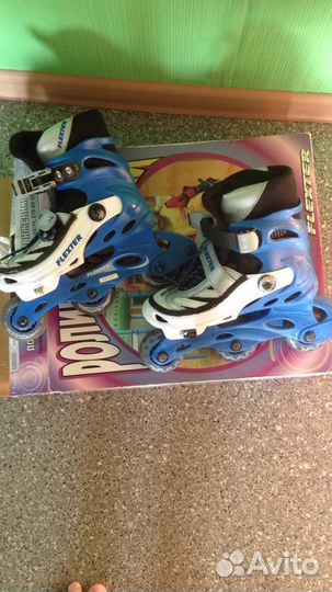 Роликовые коньки