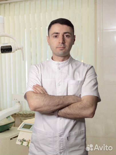 Врач стоматолог