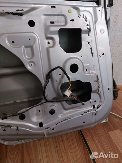 Дверь задняя левая Lancer ix серебристая