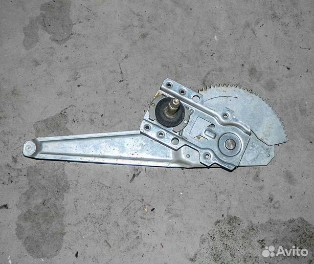 Стеклоподъемник двери задней правой Mazda 323F BJ