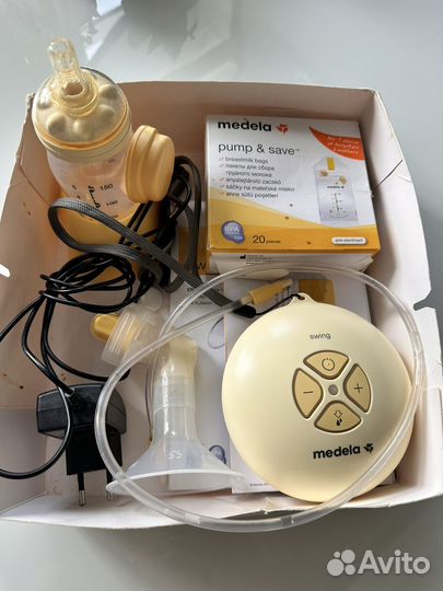 Молокоотсос medela электрический