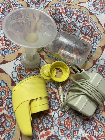 Молокоотсос medela mini electric