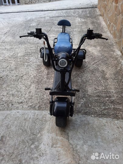 Электроскутер трицикл