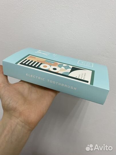 Электрическая зубная щётка