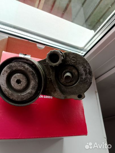 Натяжитель ремня генератора Opel Astra H